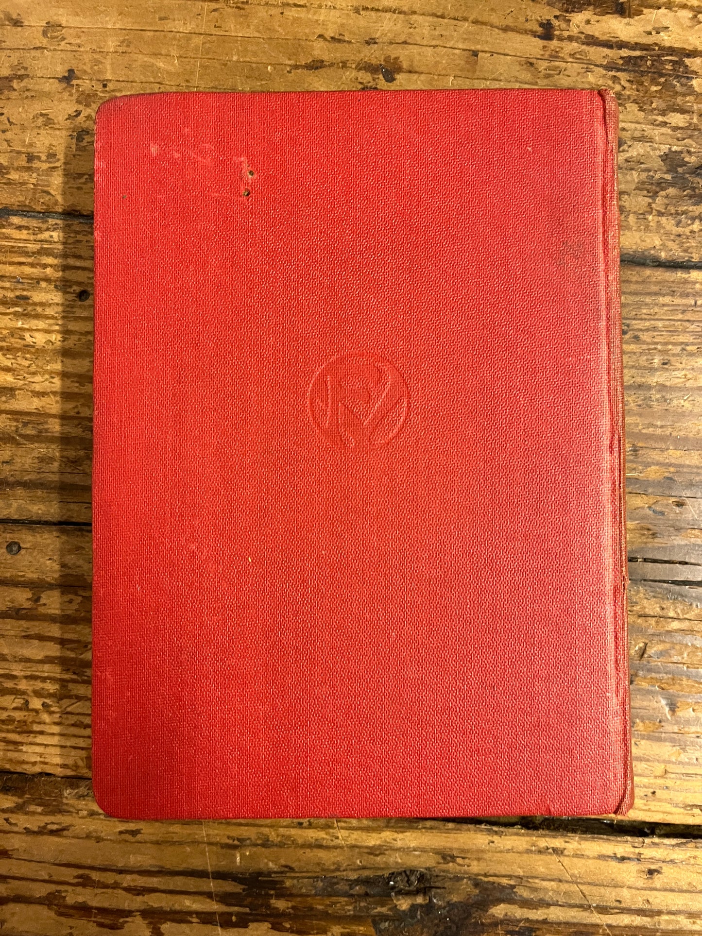 back cover of the book "an unshared secret"on a wooden surface