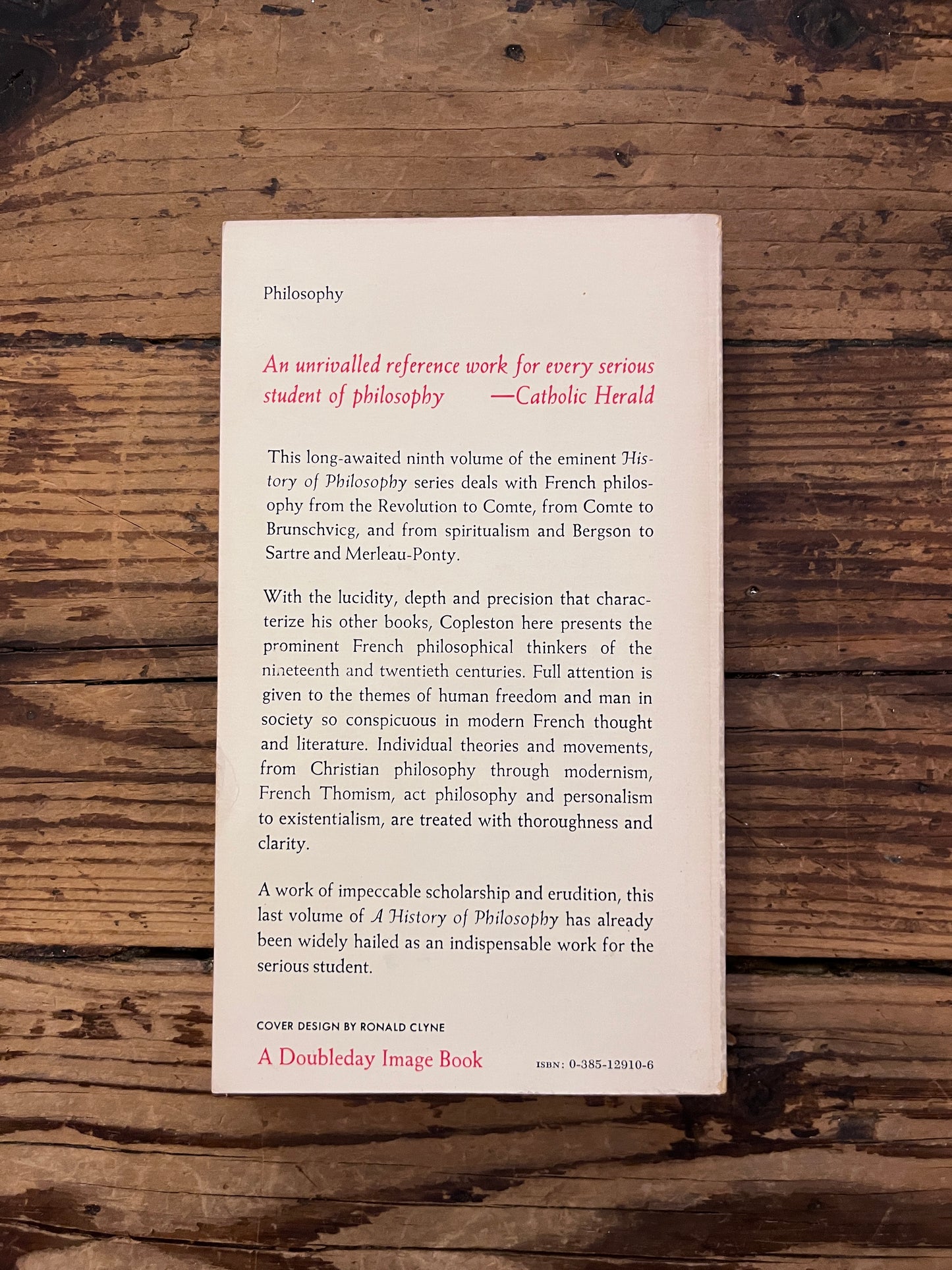 photo of the cover of the book " a history of philosophy" on a wooden background