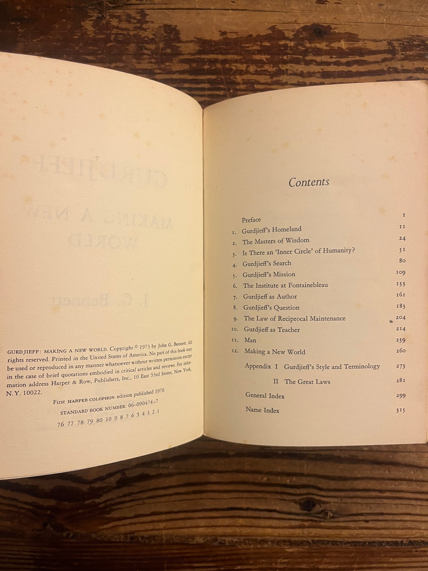 open book titled 'Gurdjieff: Making a New World' by John G. Bennett showing the contents on a wooden surface