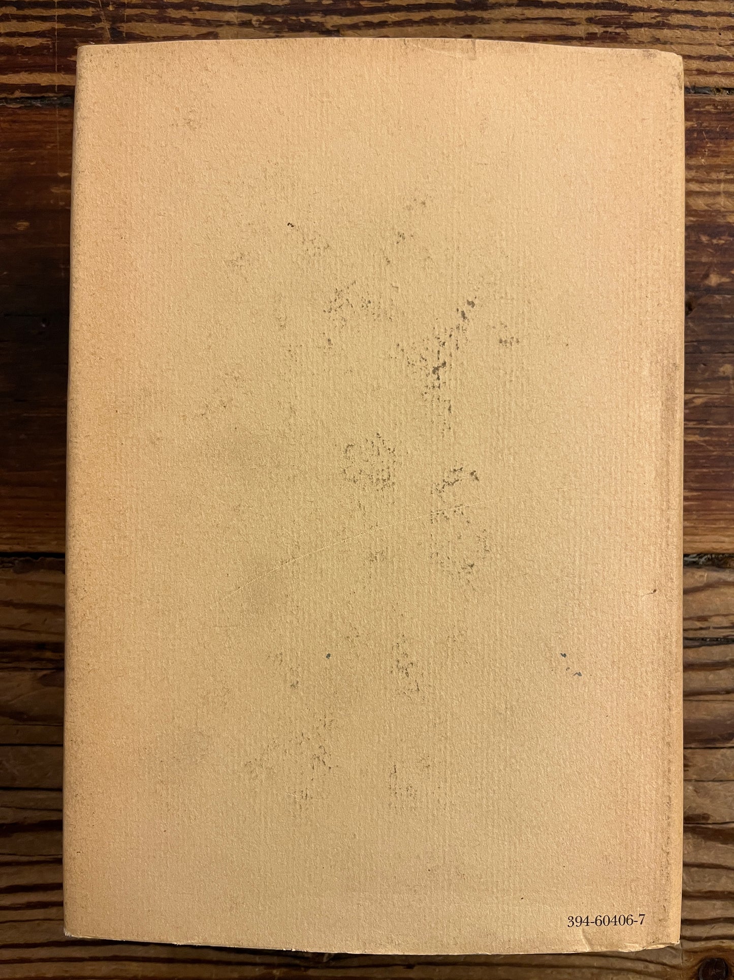 back cover of a book on a wooden surface