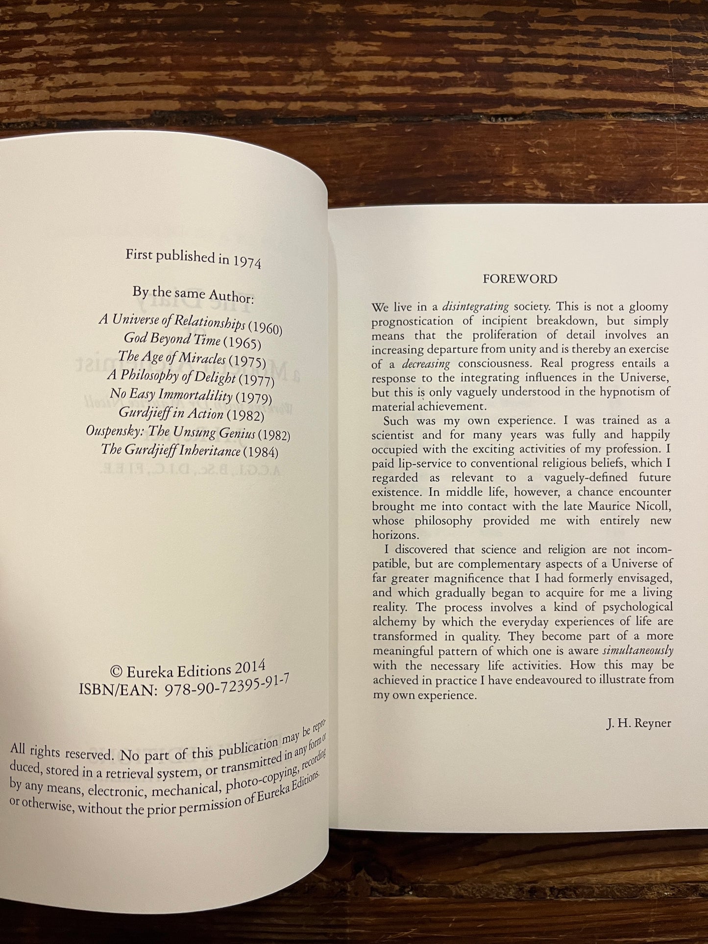 Open book titled 'the Diary of a modern Alchemist' by J.H. Reyner