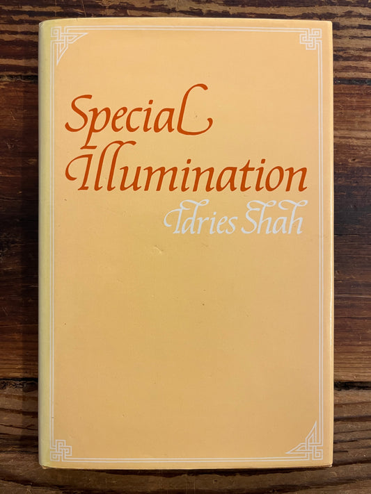 Book titled 'Special Illumination' by Idries Shah on a wooden surface