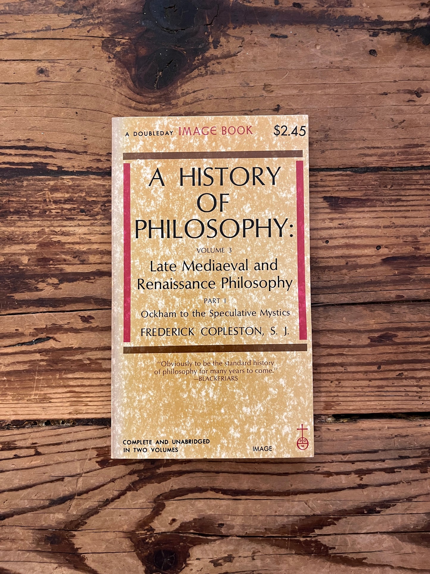 photo of the cover of the book "a history of philosophy" on a wooden background