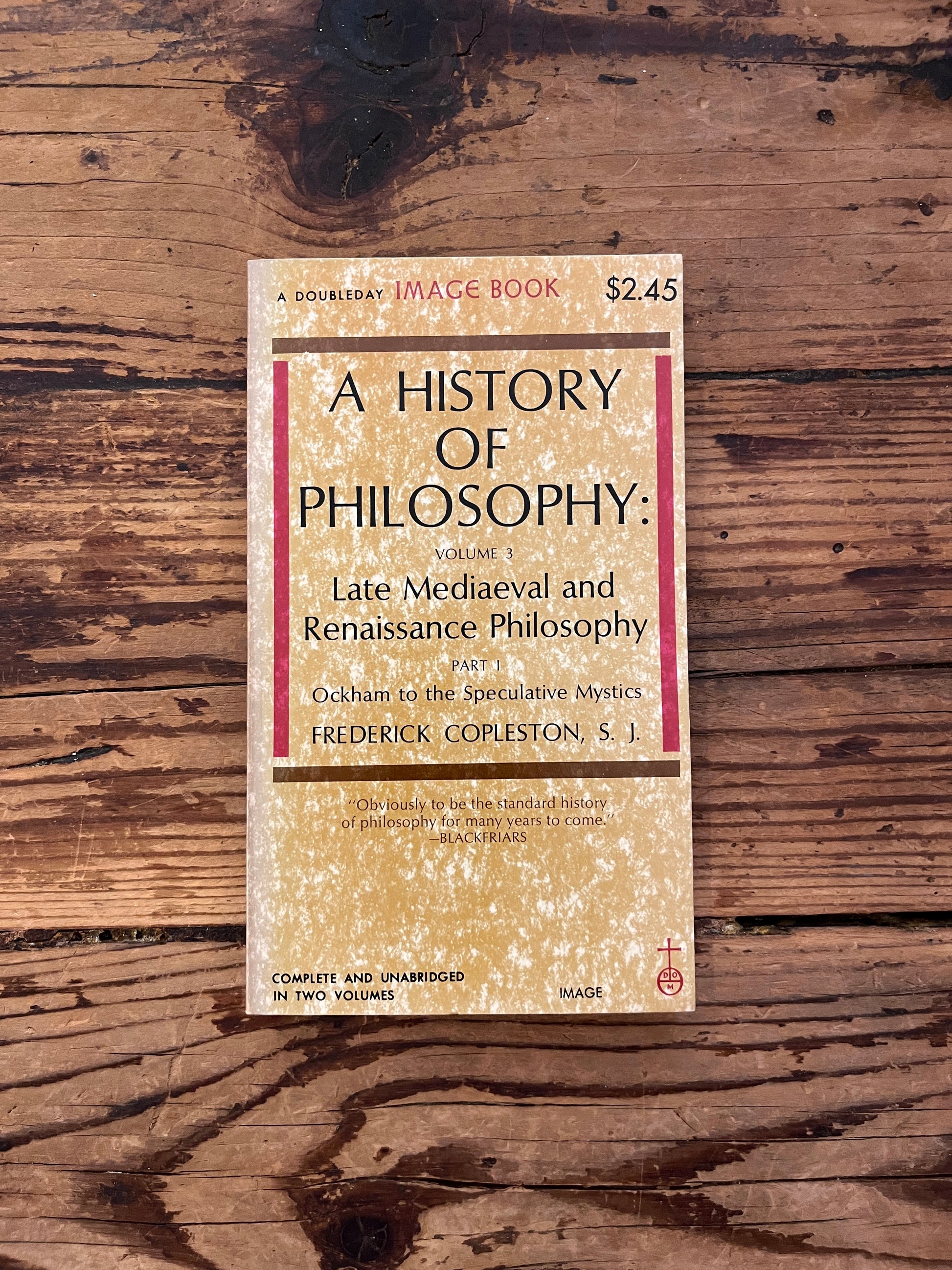 photo of the cover of the book "a history of philosophy" on a wooden background
