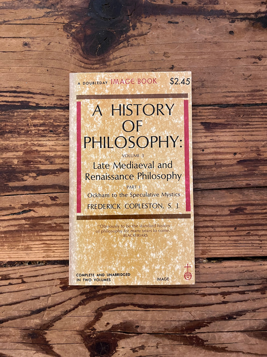 photo of the cover of the book "a history of philosophy" on a wooden background