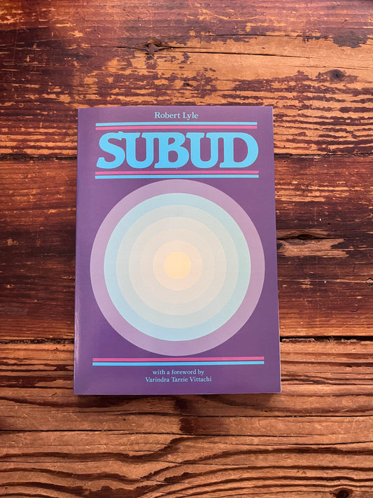 Front cover of book with the title 'Subud' by Robert Lyle on a wooden surface 