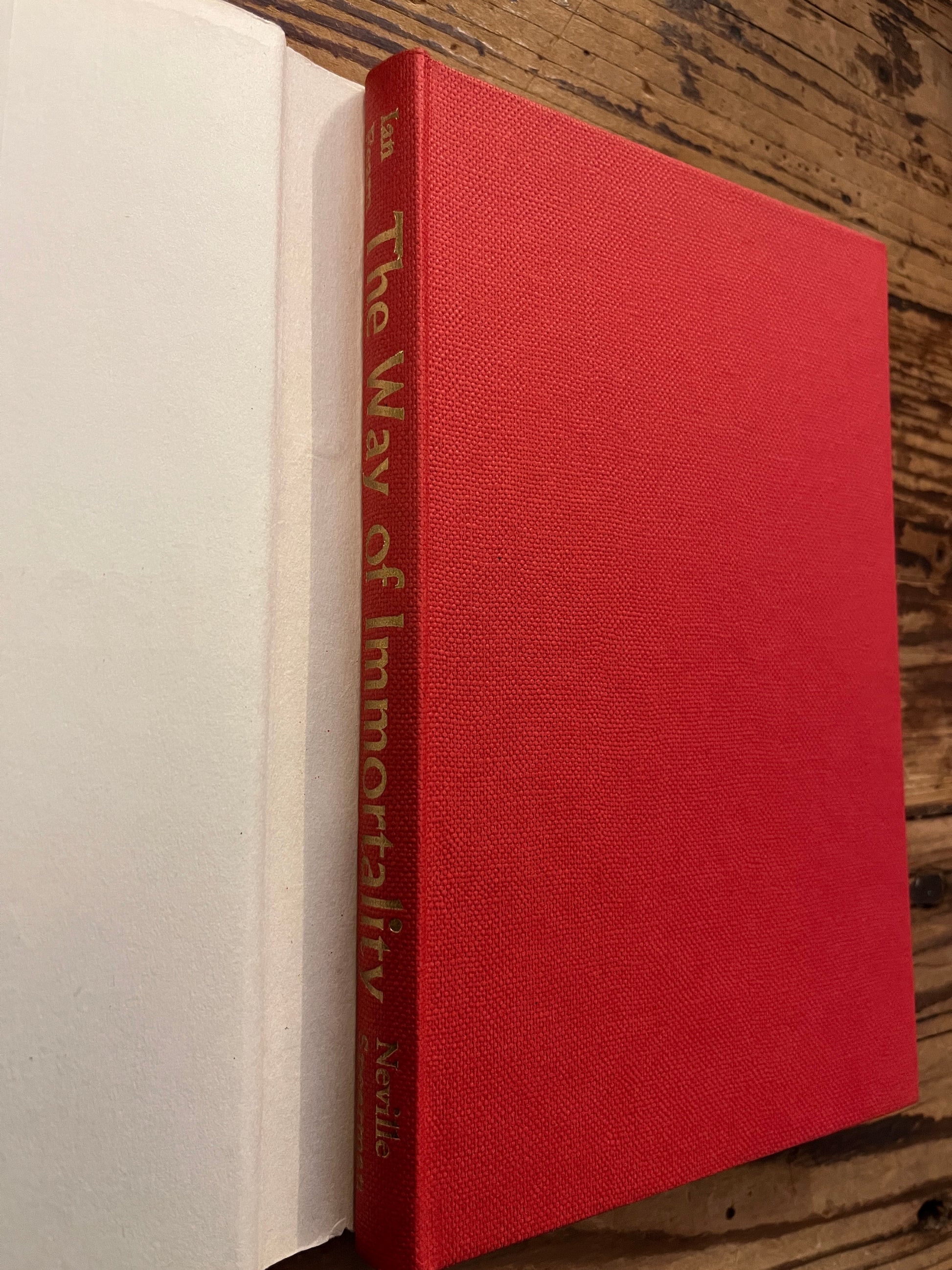 Book titled 'The Way of Immortality' by Ian Fearn on a wooden surface