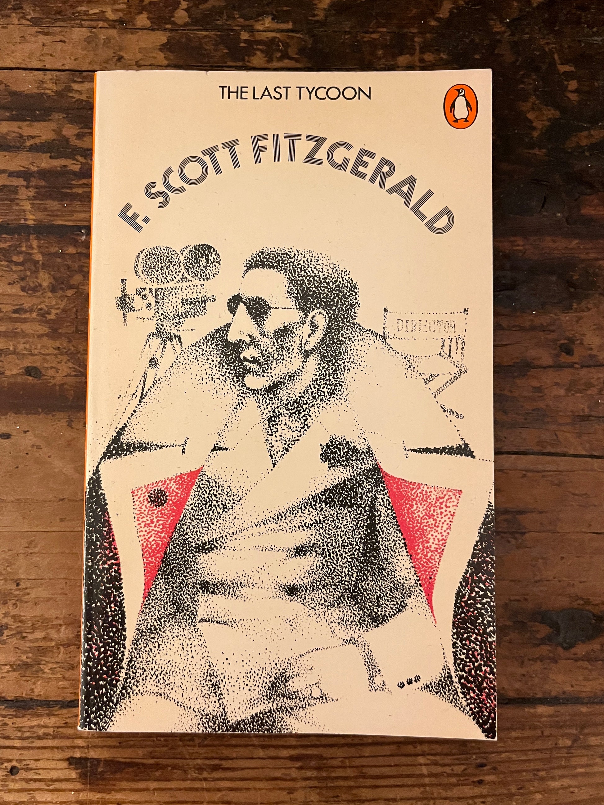 cover of the book "The last tycoon" on a wooden background