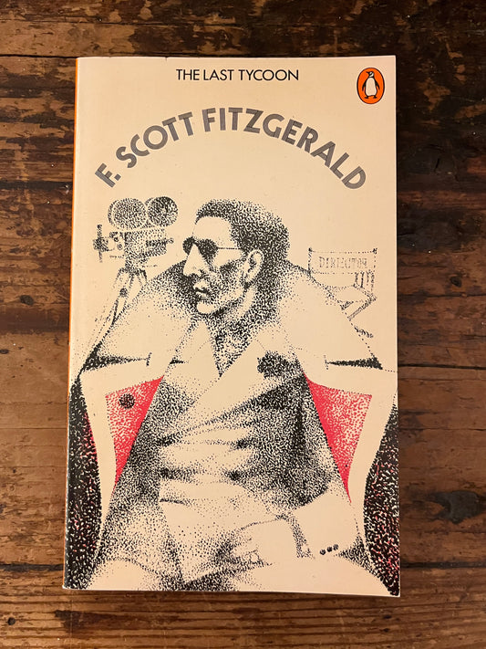 cover of the book "The last tycoon" on a wooden background