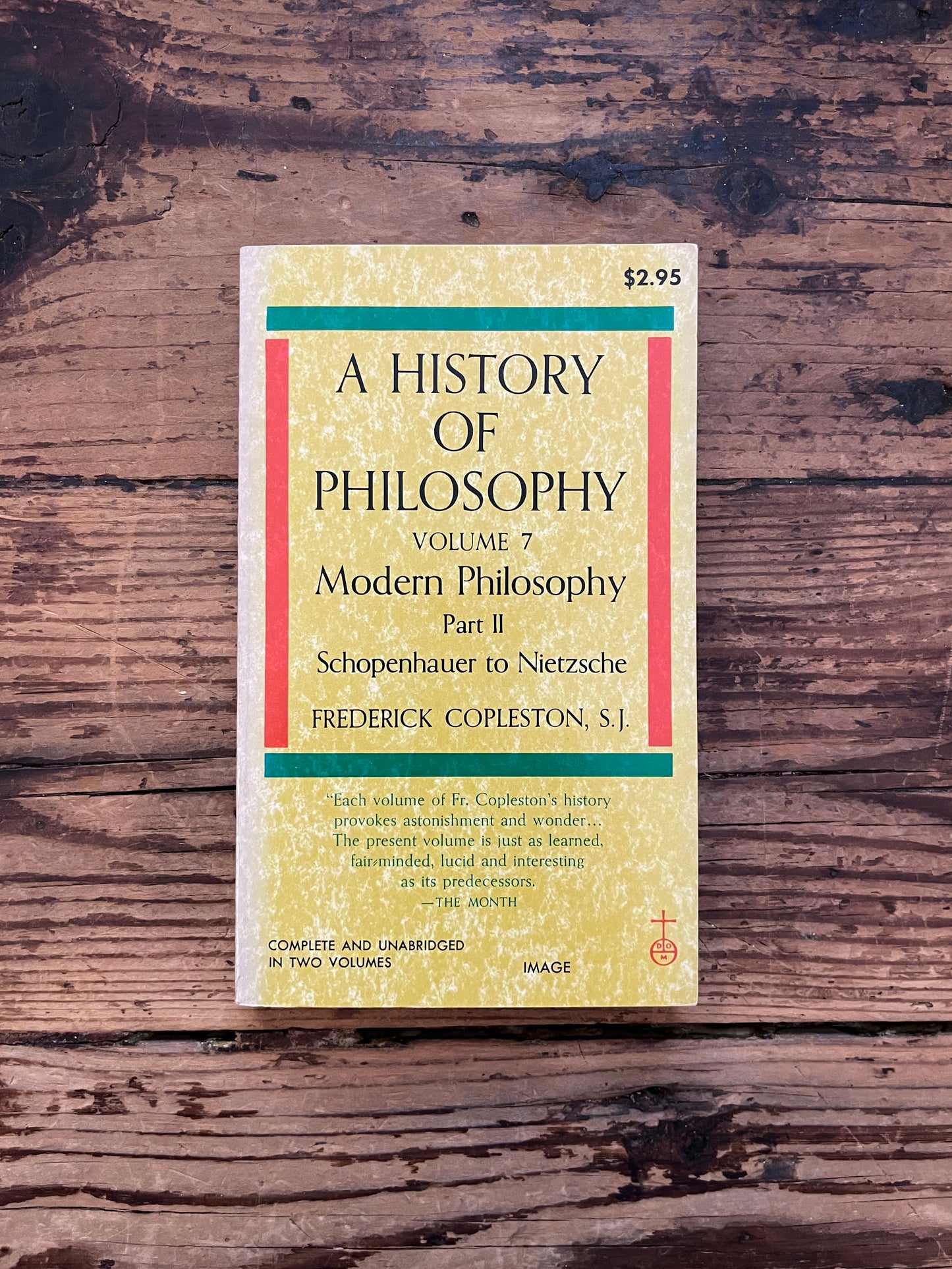 photo of the cover of the book "a history of philosophy" on a wooden background