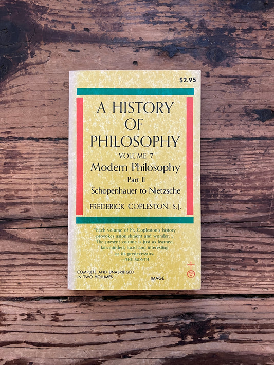 photo of the cover of the book "a history of philosophy" on a wooden background