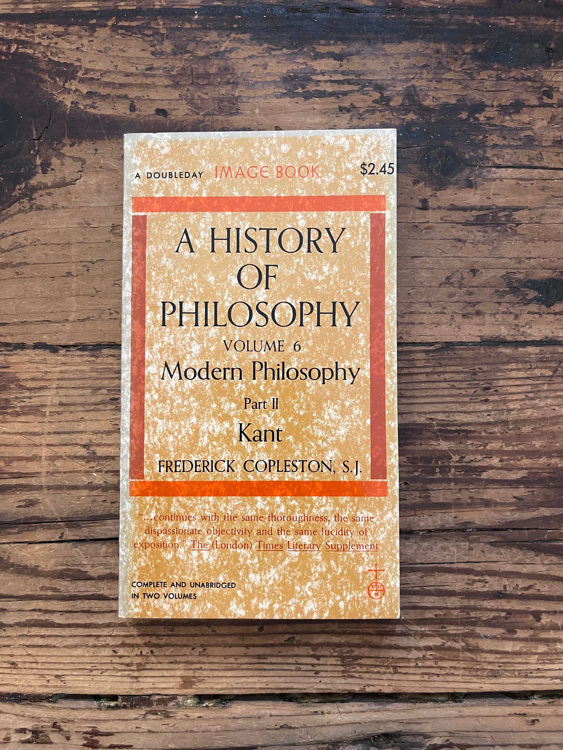 photo of the cover of the book " a history of philosophy" on a wooden background