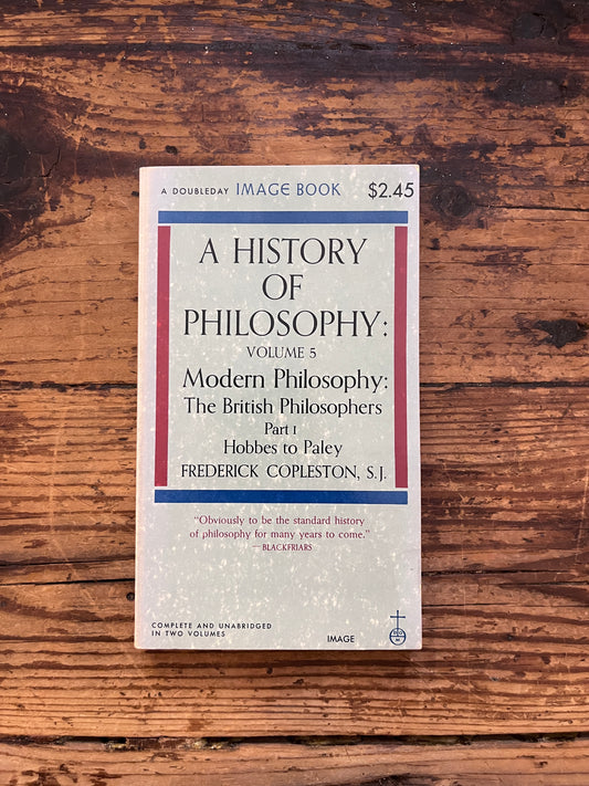 Photo of the cover of the book " a history of philosophy" on a wooden background