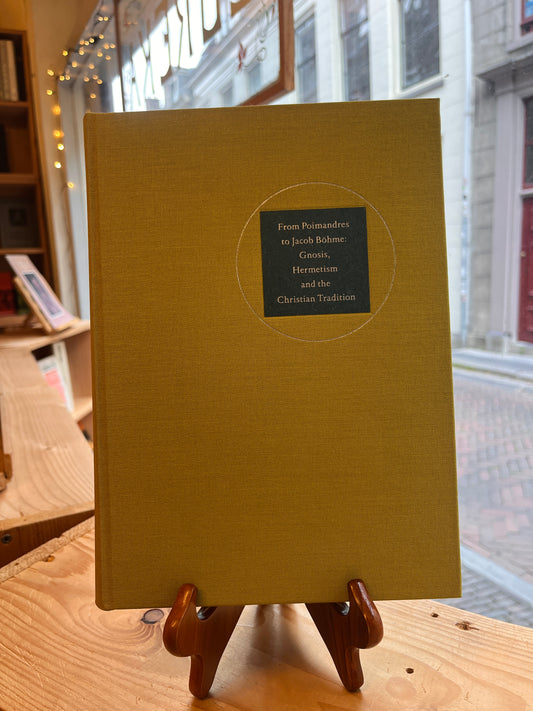 Front cover of book titled 'From Poimandres to Jacob Böhme: Gnosis, Hermetism, and the Christian tradition Edited by Roelof van den Broek and Cis van Heertum' in front of  window