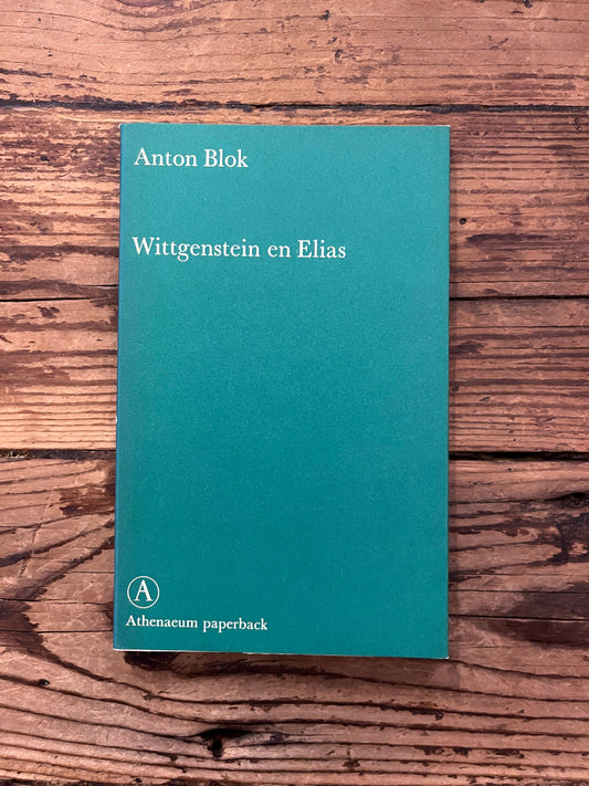 foto van de omslag van het boek "Wittgenstein en Elias"op houten achtergrond