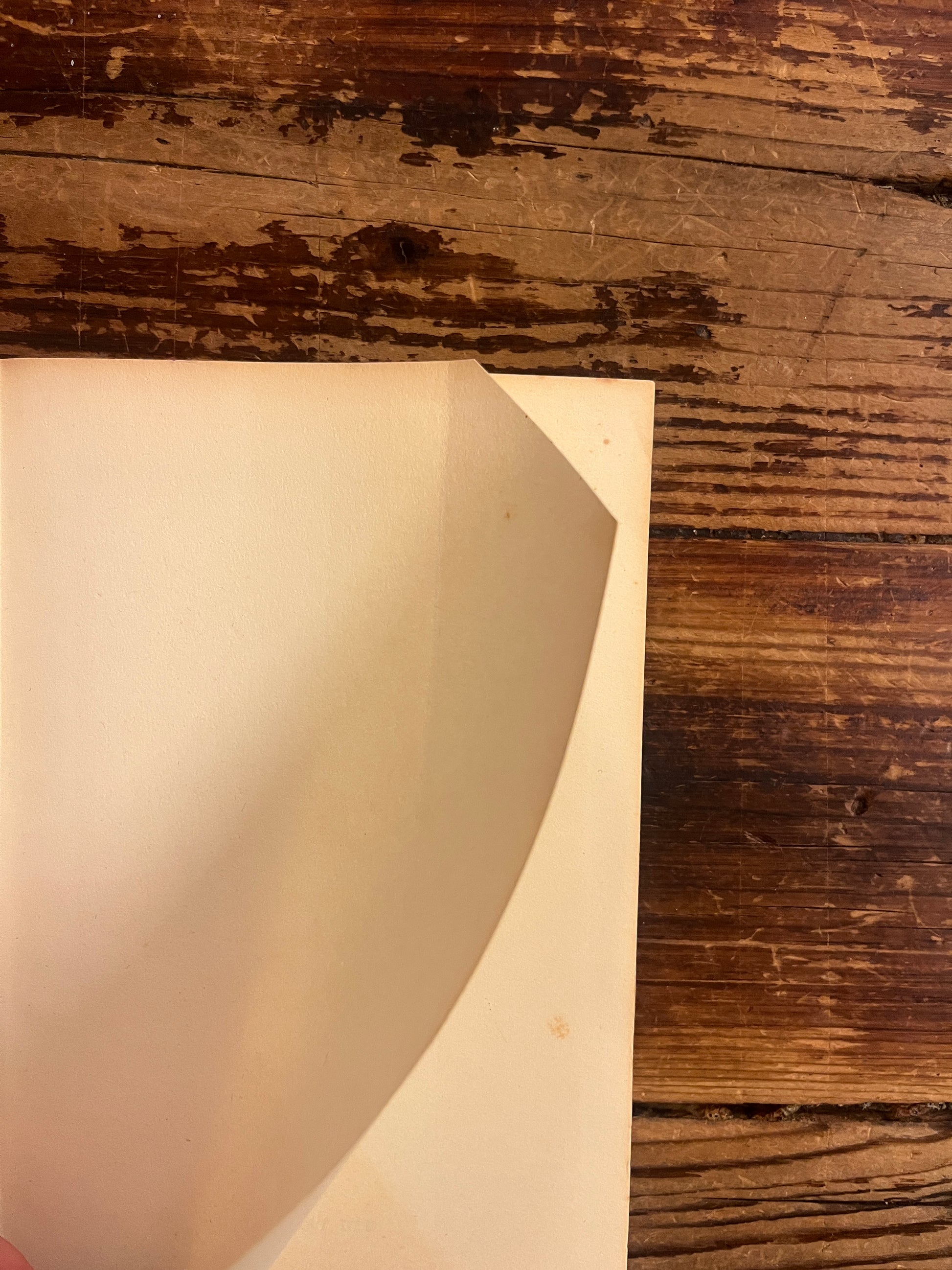 clipped corner of a book 