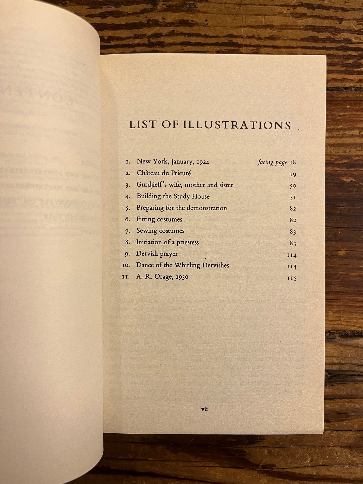 Open book titled 'Teachings of Gurdjieff: A Pupil's Journal' by C.S. Nott showing a list of illustrations on a wooden surface