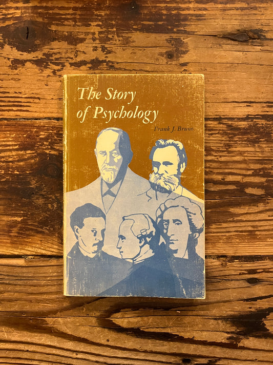 Book titled 'the story of psychology'  by Frank J. Bruno on a wooden surface 