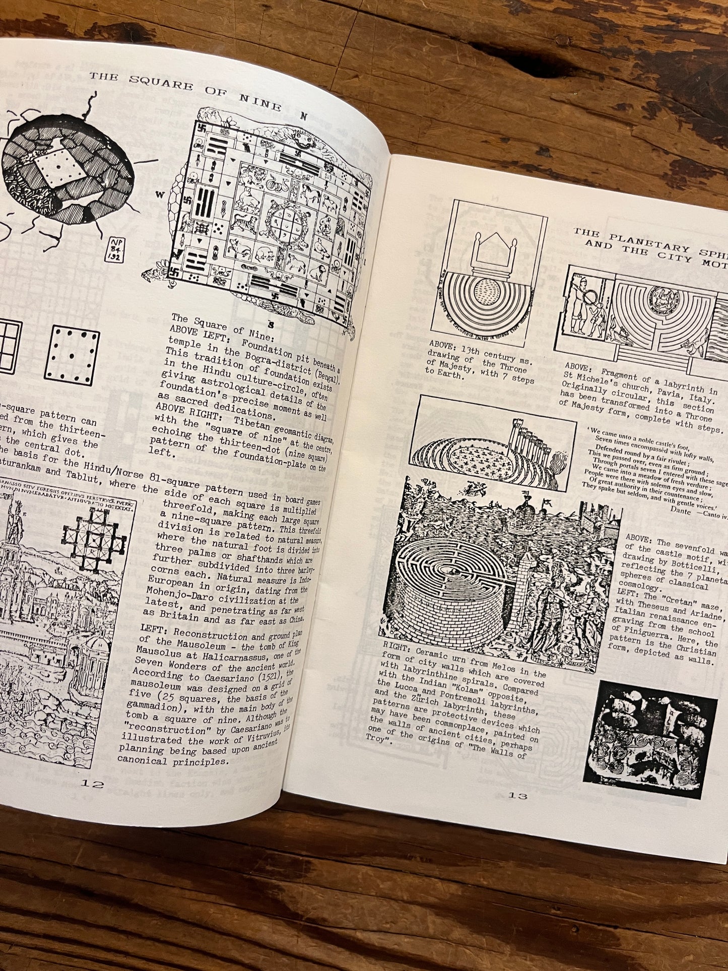 Open booklet with the title 'Labyrinths, their geomancy and symbolism' by Nigel Pennick on a wooden surface 