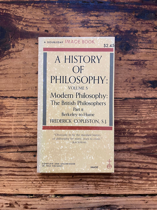 photo of the cover of the book "a history of philosophy" on a wooden background