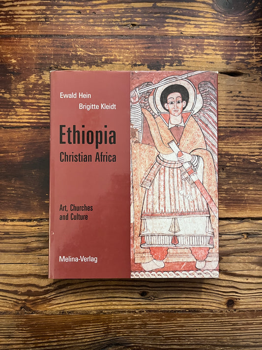 Book titled 'Ethiopia Christian Africa' by Ewald Hein and Brigitte Kleidt on a wooden surface