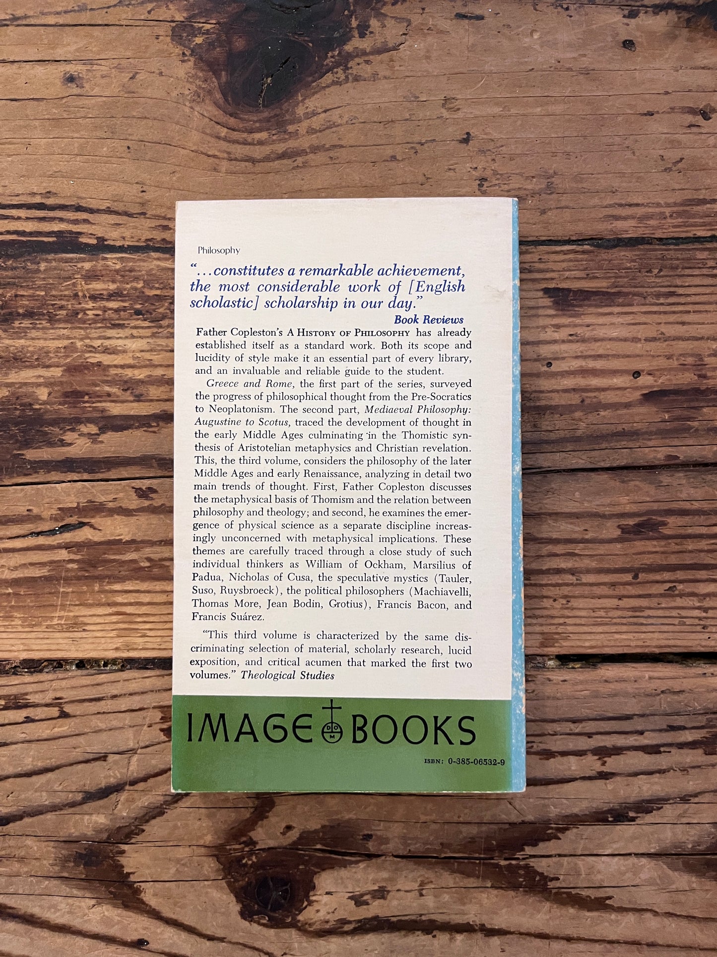 photo of the cover of the book "a history of philosophy" on a wooden background