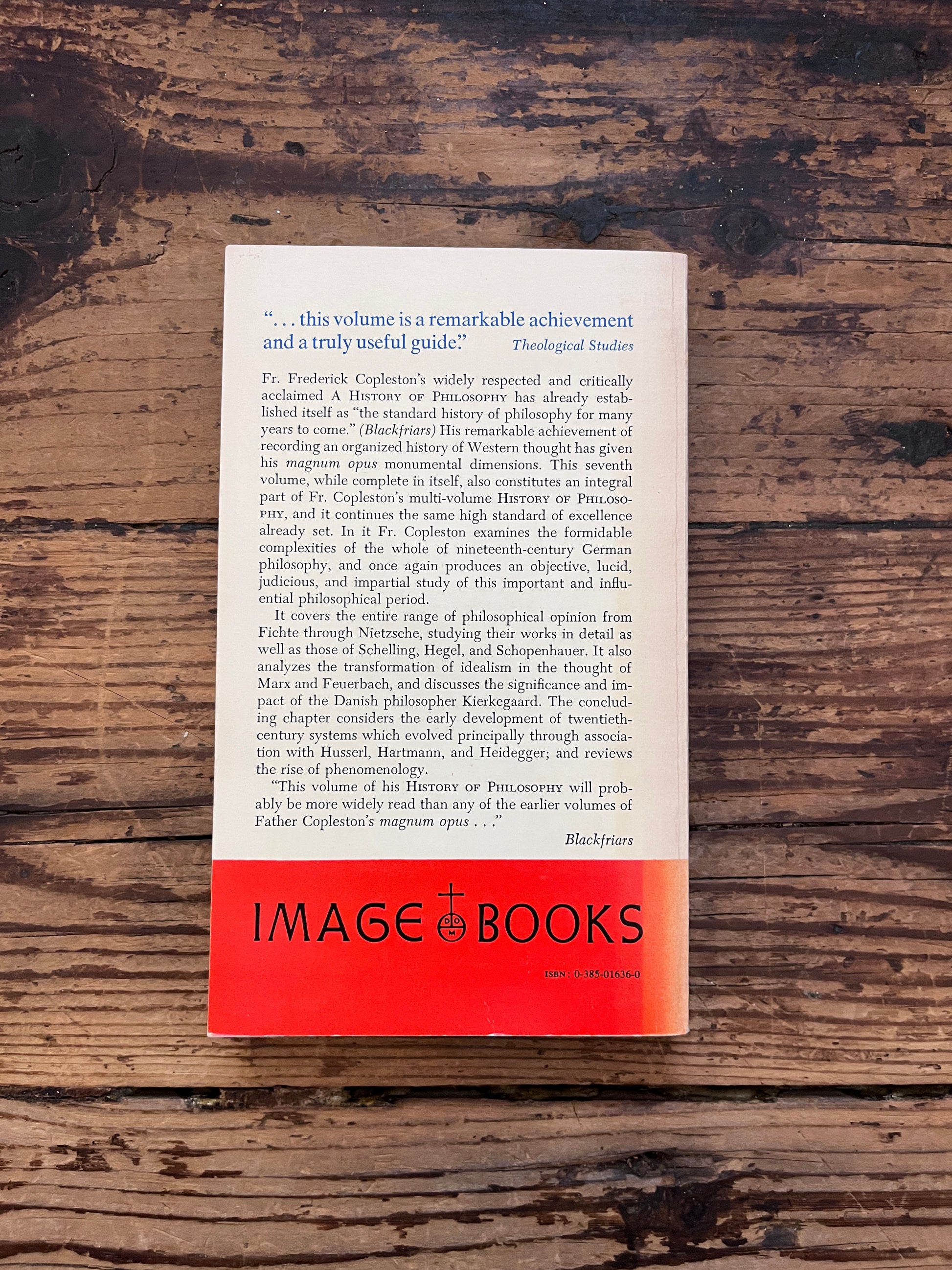 photo of the cover of the book "a history of philosophy" on a wooden background