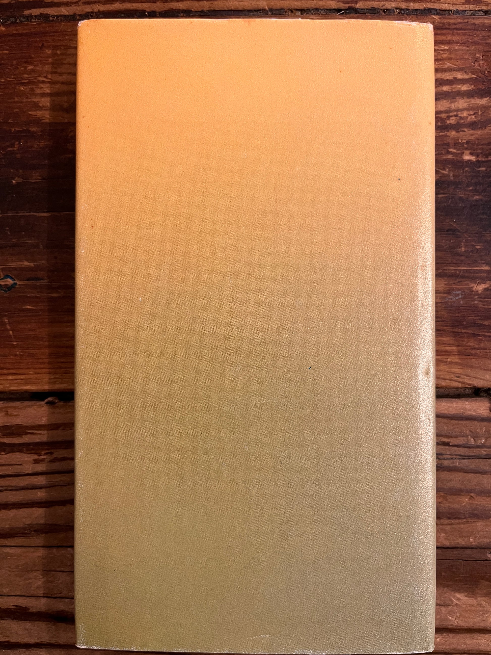 Achterkant met stof omslag van boek met de titel 'De wijzen uit het Oosten' door Jakob Streit