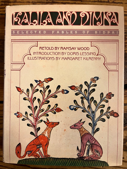 Front cover with dust-jacket of book titled 'Kalila and Dimna, selected Fable of Bidpai' retold by Ramsay Wood  on a wooden surface