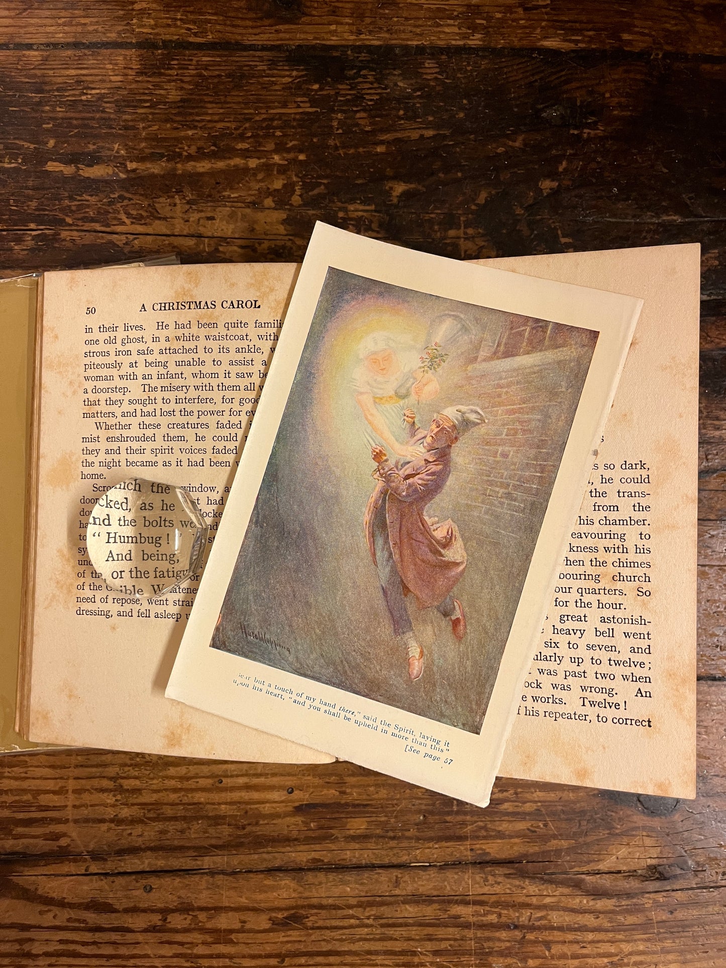 open book "A christmas Carol"  with an illustration of Harold Copping