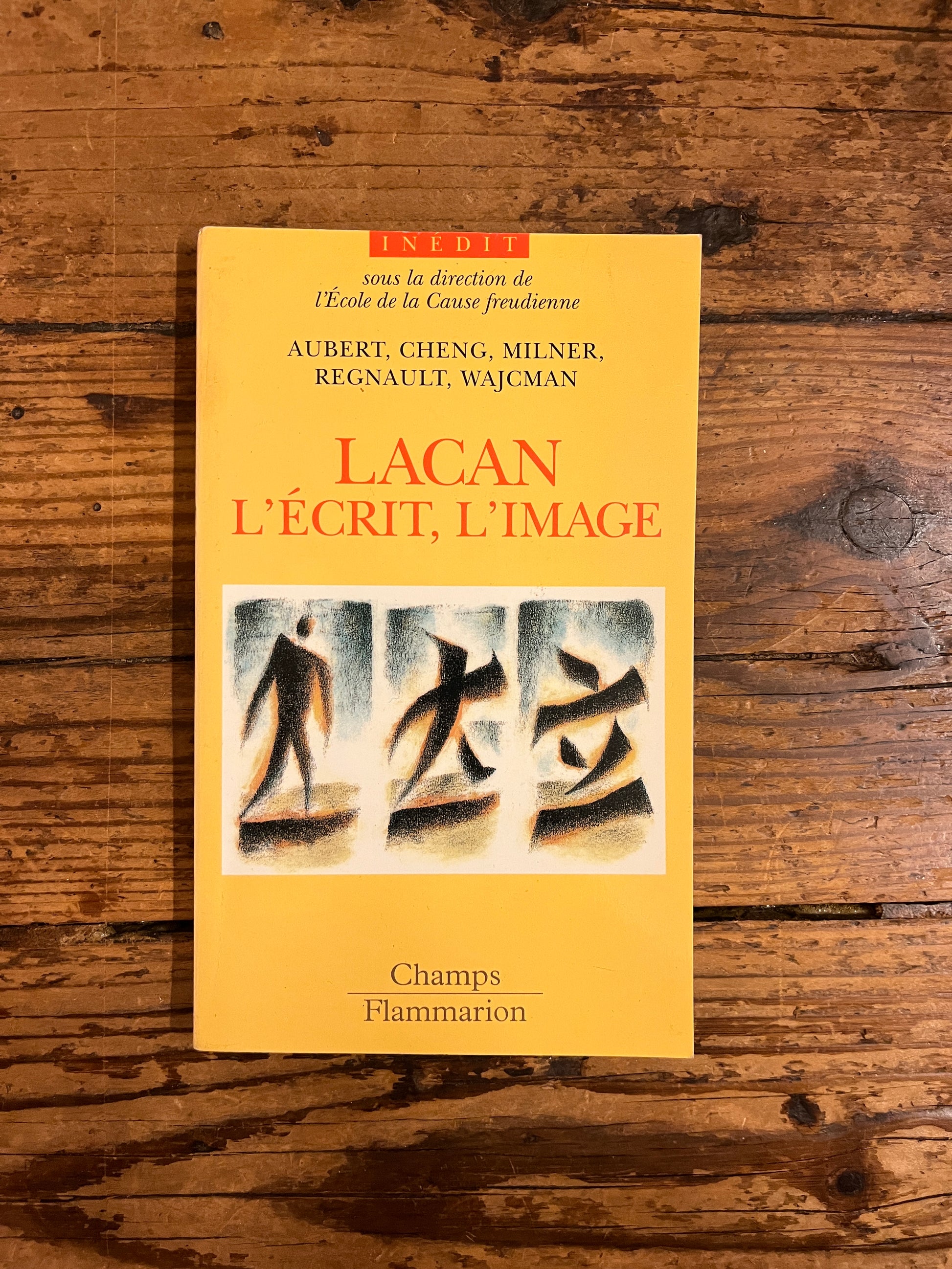 couverture du livre "lacan l'ecrit et l'image"sur fond de bois