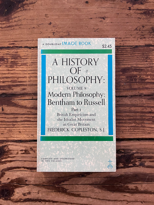 photo of the cover of the book " a history of philosophy" on a wooden background