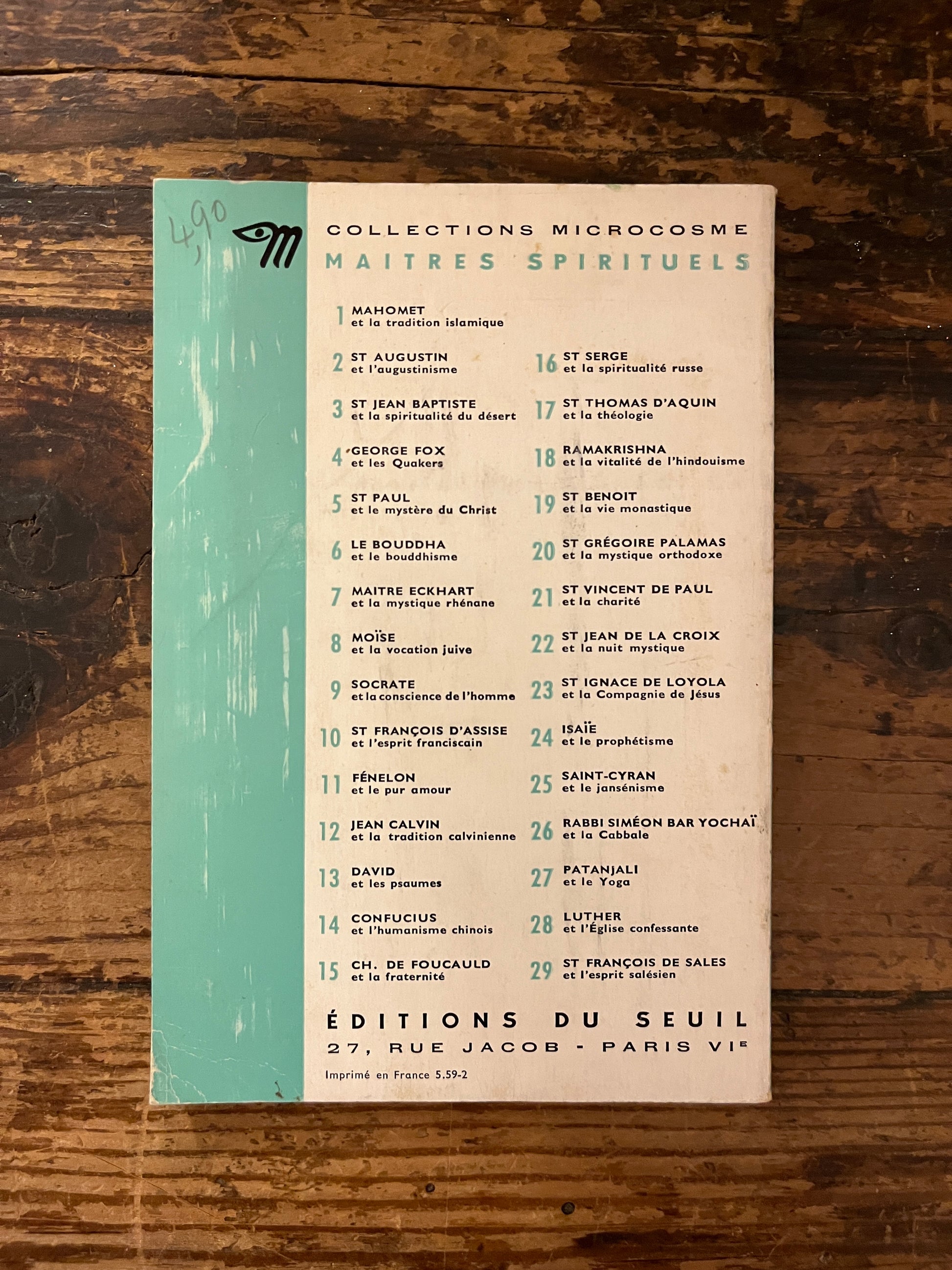 Quatrième de couverture du livre "Saint benoit et la vie monastique" sur fond de bois