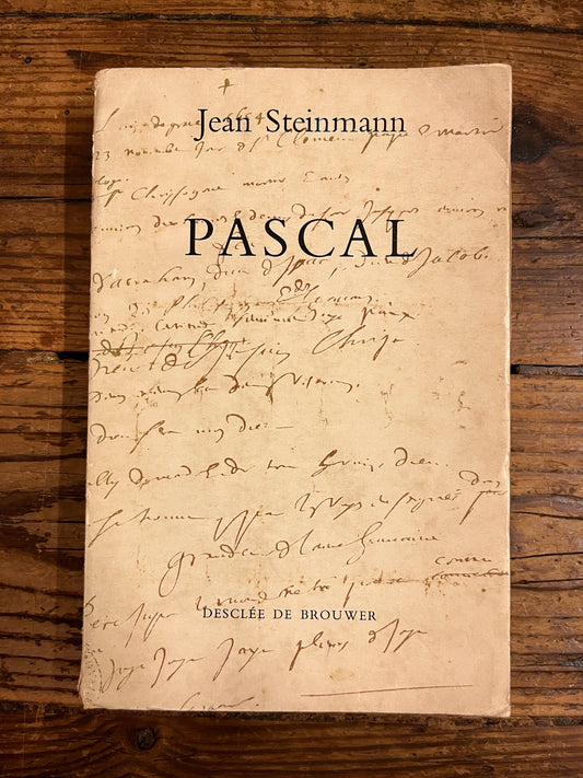 couverture du livre "Pascal" sur fond de bois