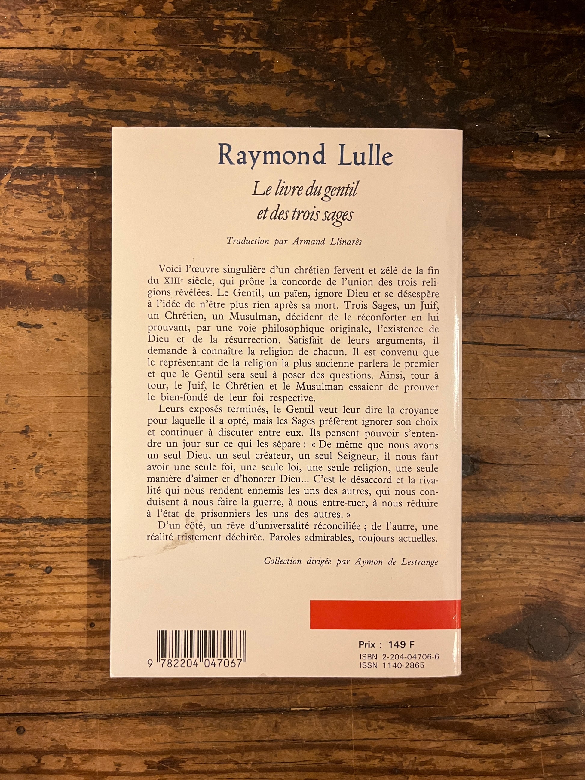 quatrième de couverture du livre "le livre du gentil et des trois sages" sur fond de bois