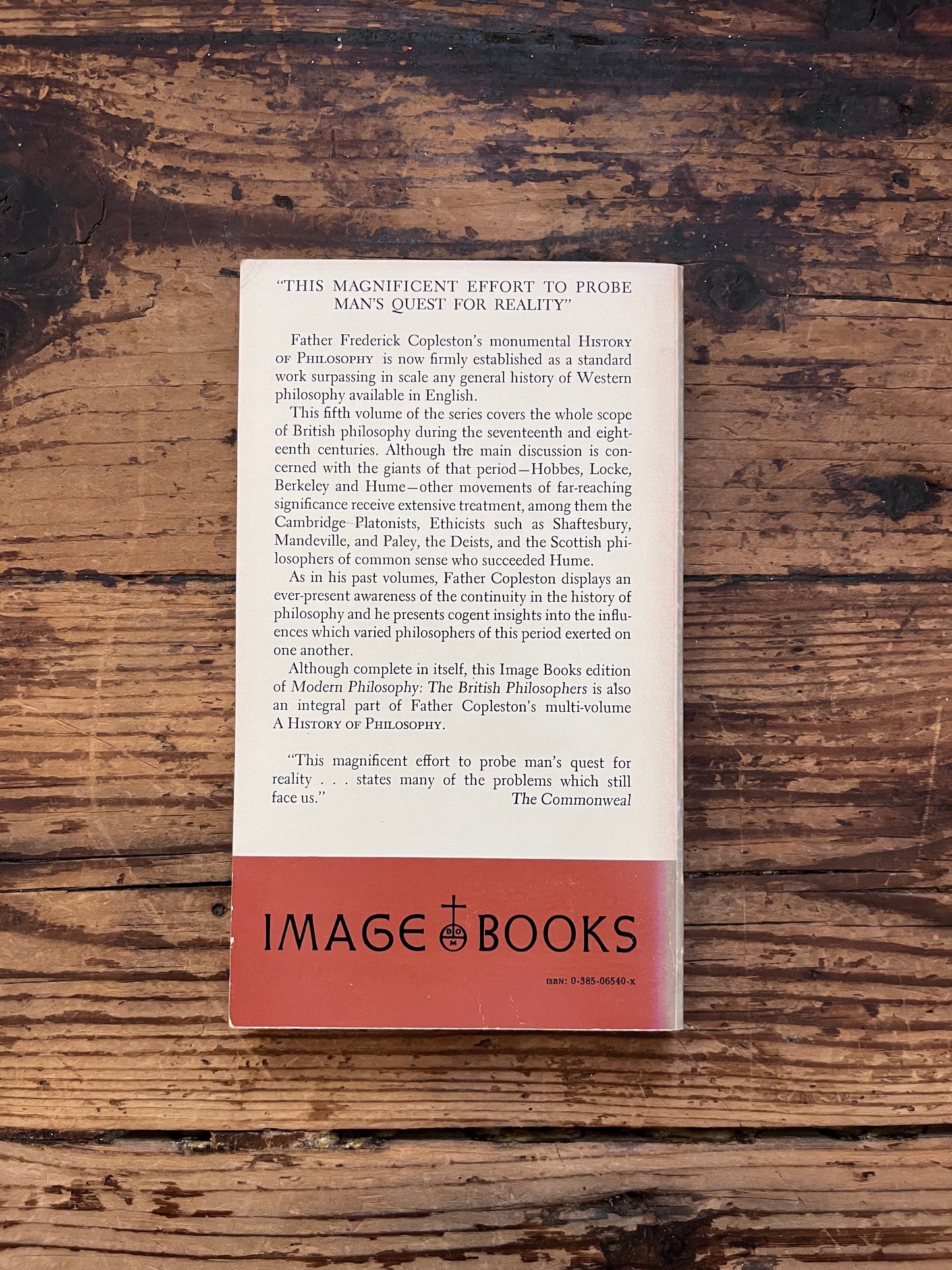 photo of the cover of the book " a history of philosophy" on a wooden background