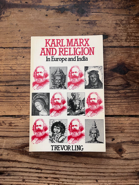 foto of the cover of the book "karl marx and religion in europe and india on a wooden background