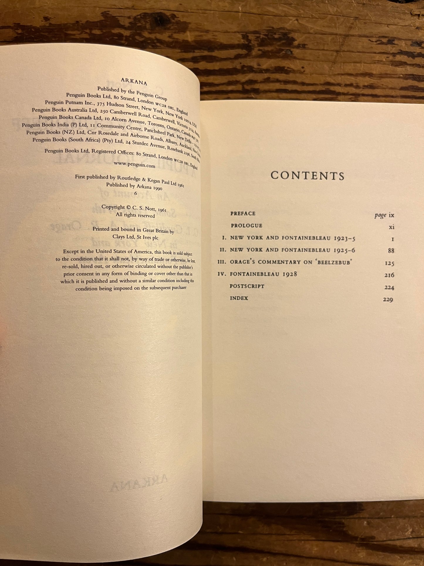 Open book showing the contents titled 'Teachings of Gurdjieff: A Pupil's Journal' by C.S. Nott on a wooden surface