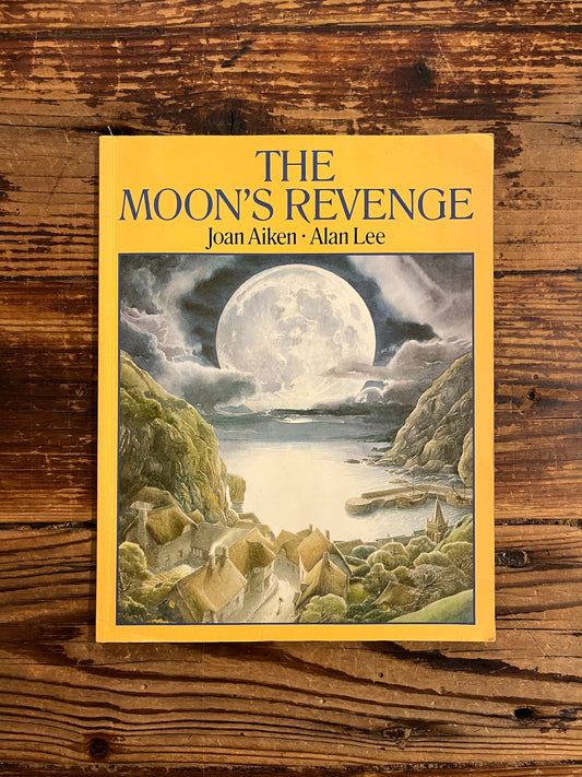 Book cover of 'The Moon's Revenge' on a wooden surface