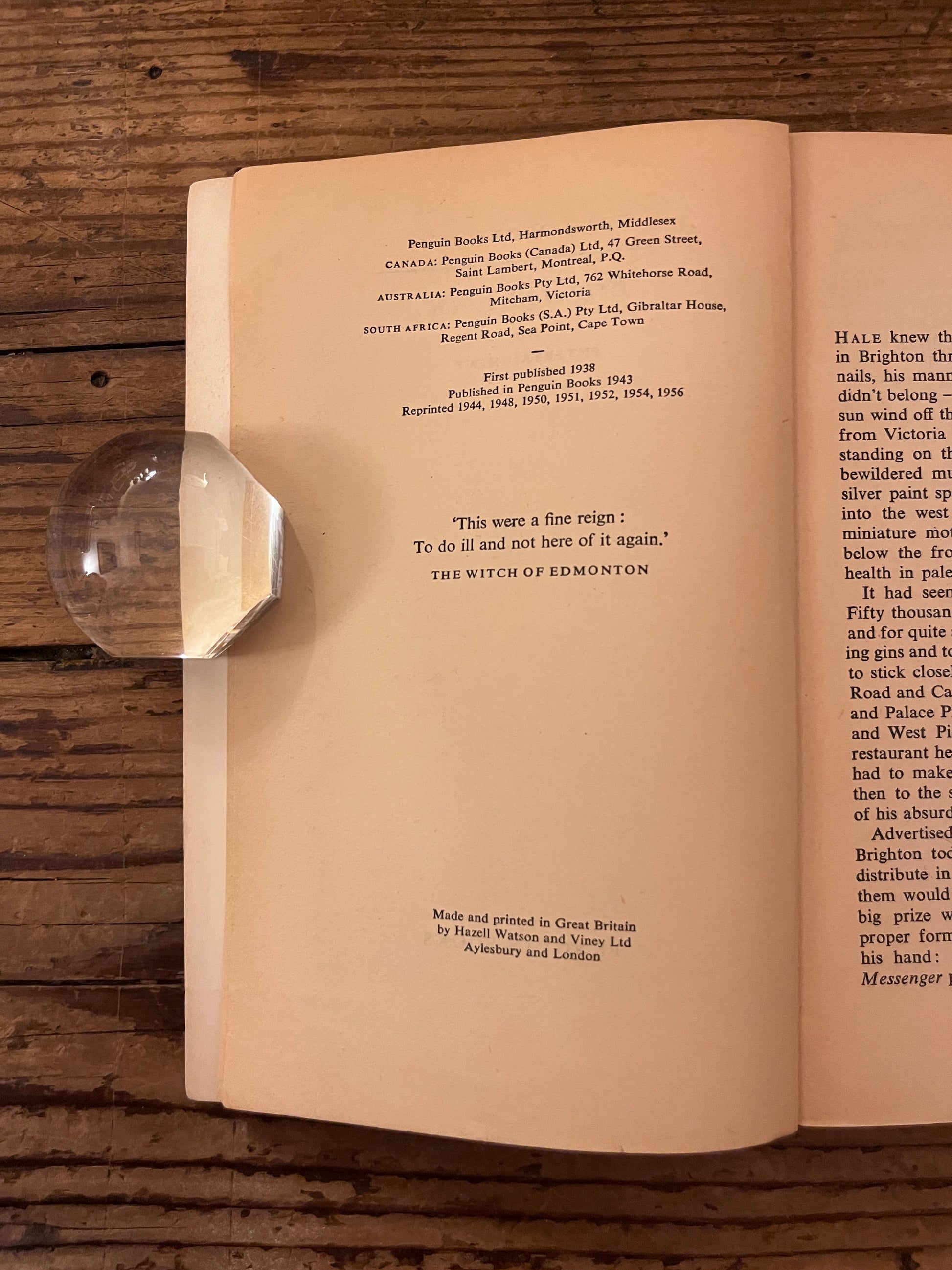 photo of the title page of the book "brighton rock" on a wooden background