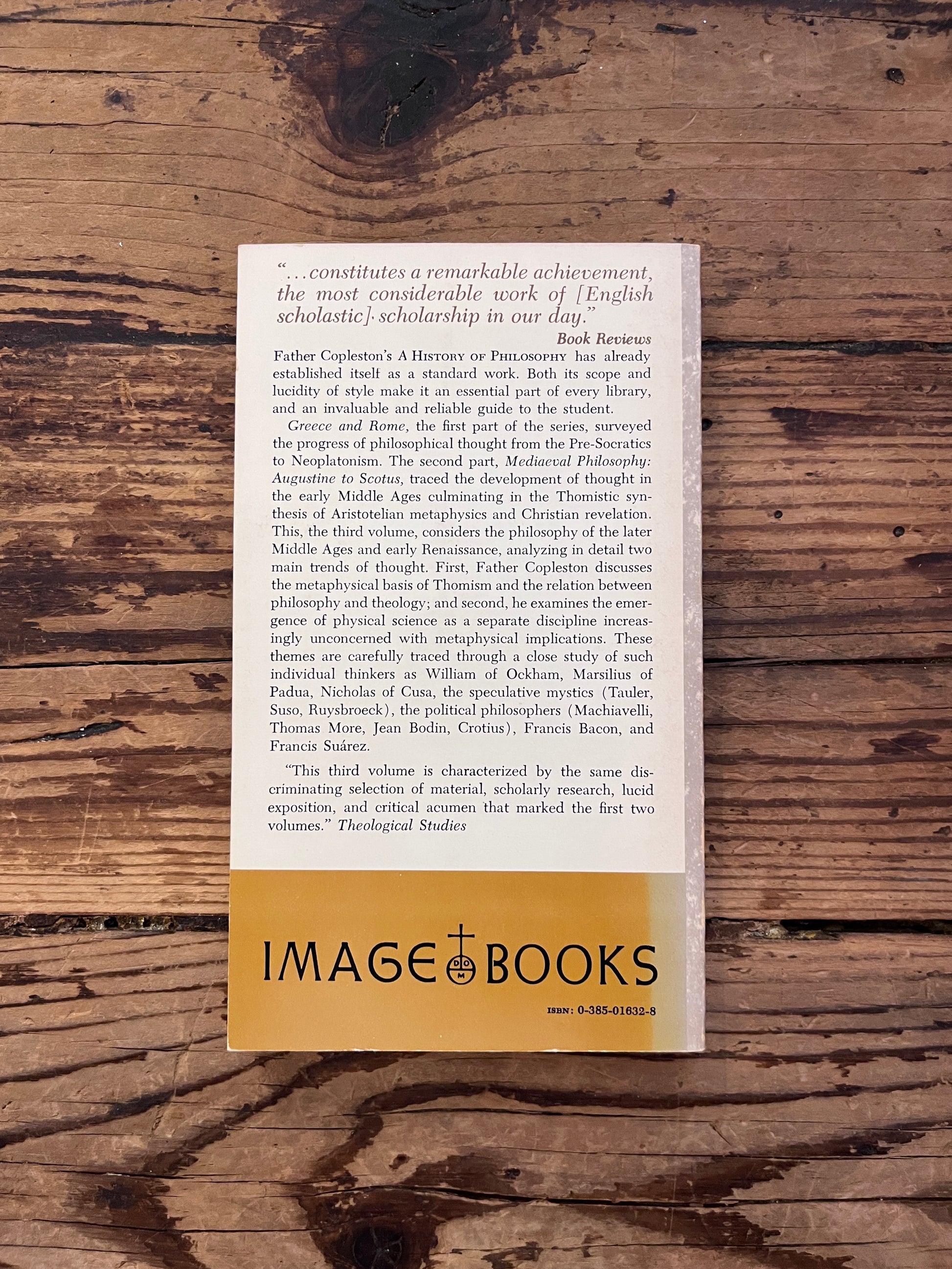 photo of the cover of the book "a history of philosophy" on a wooden background