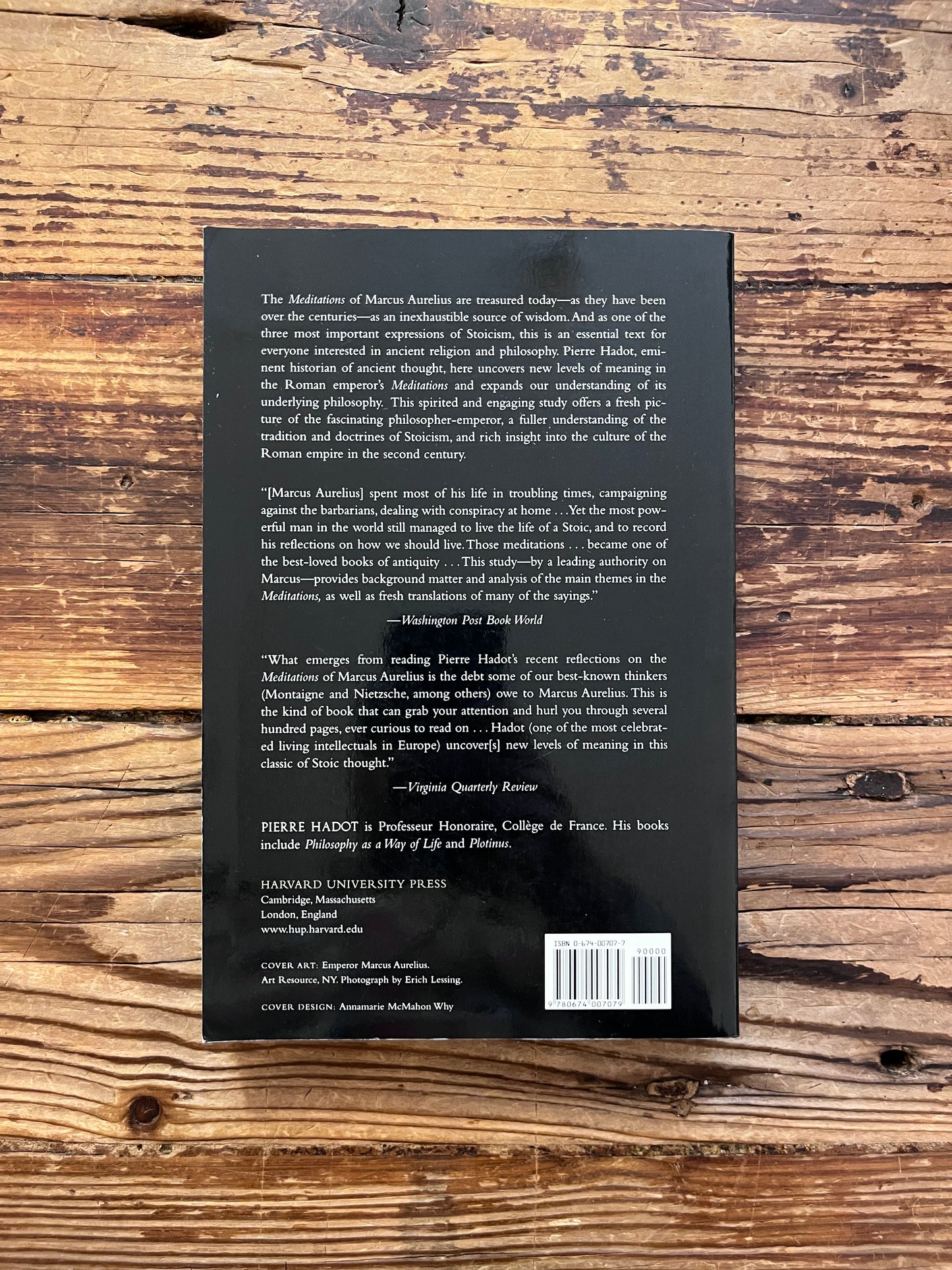 photo of the backcover of the book "The inner citadel" on a wooden background