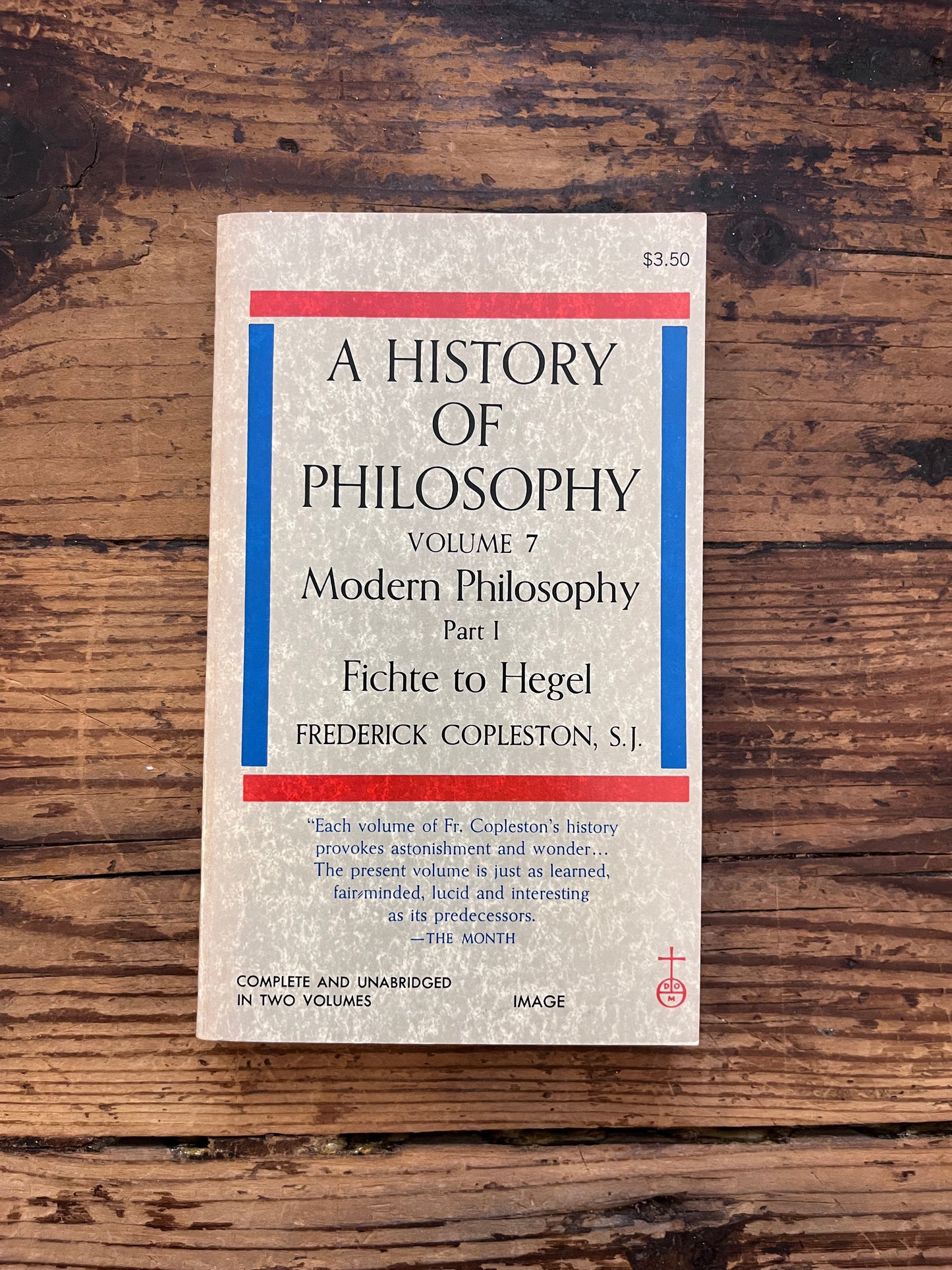 photo of the cover of the book "a history of philosophy" on a wooden background