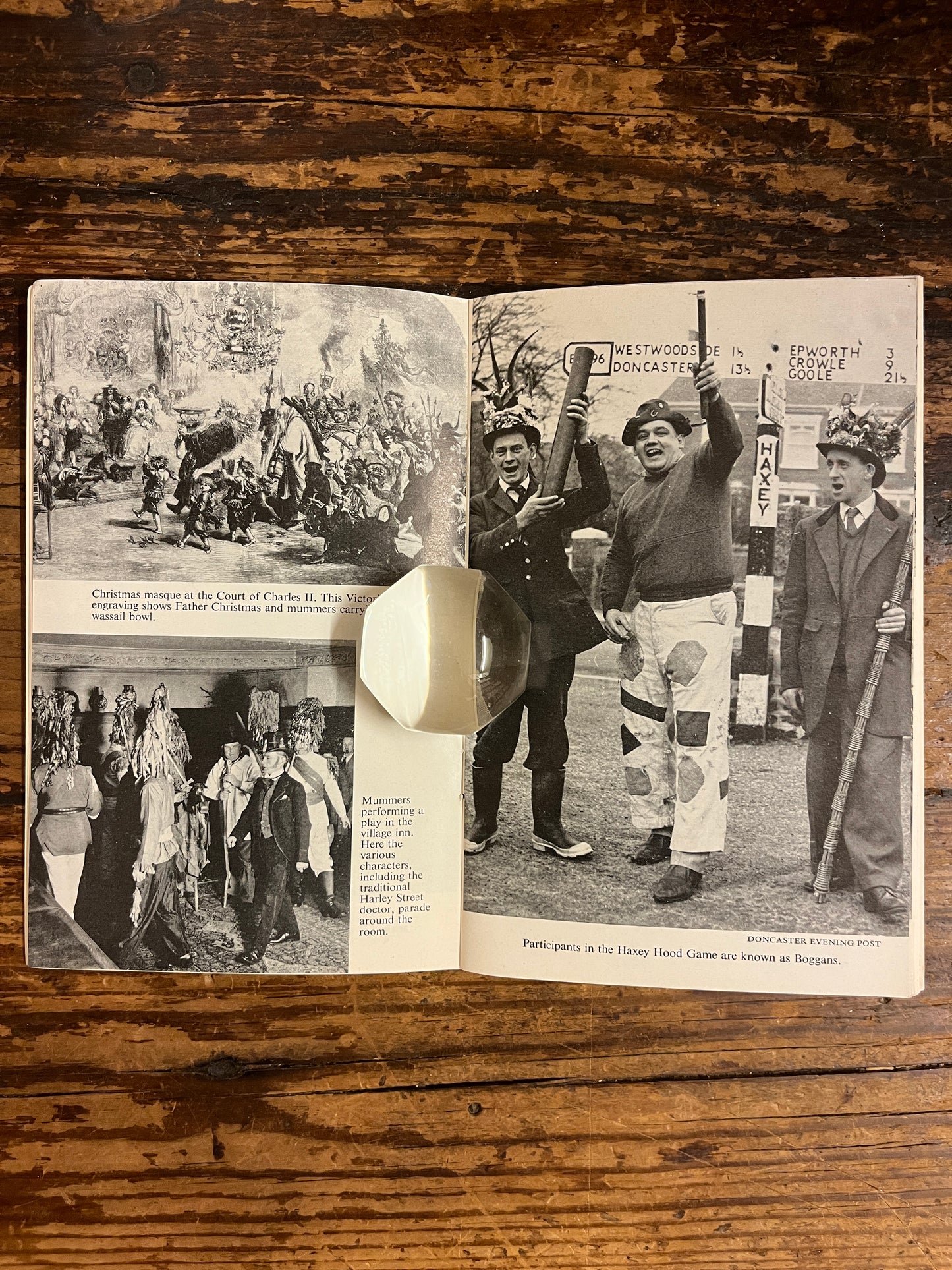 preview of the booklet "Christmas customs and folklore"on a wooden background