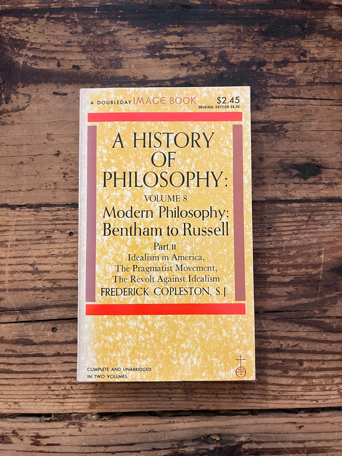 photo of the cover of the book " A history of philosophy" on a wooden background
