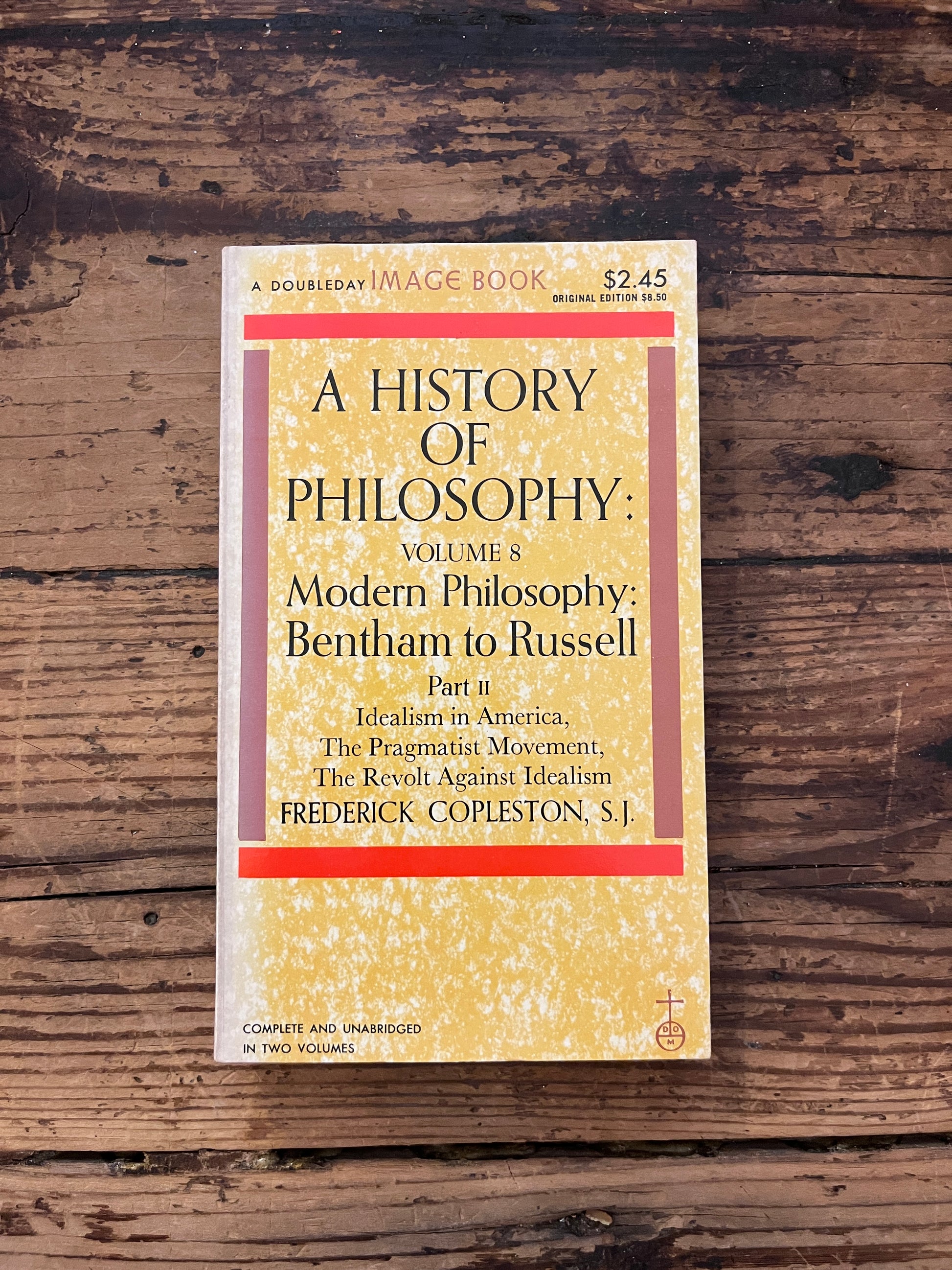 photo of the cover of the book " A history of philosophy" on a wooden background