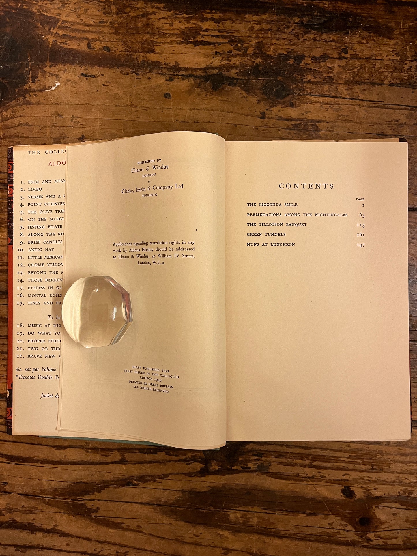 photo of the edition page of the book "Mortal coils"on a wooden background