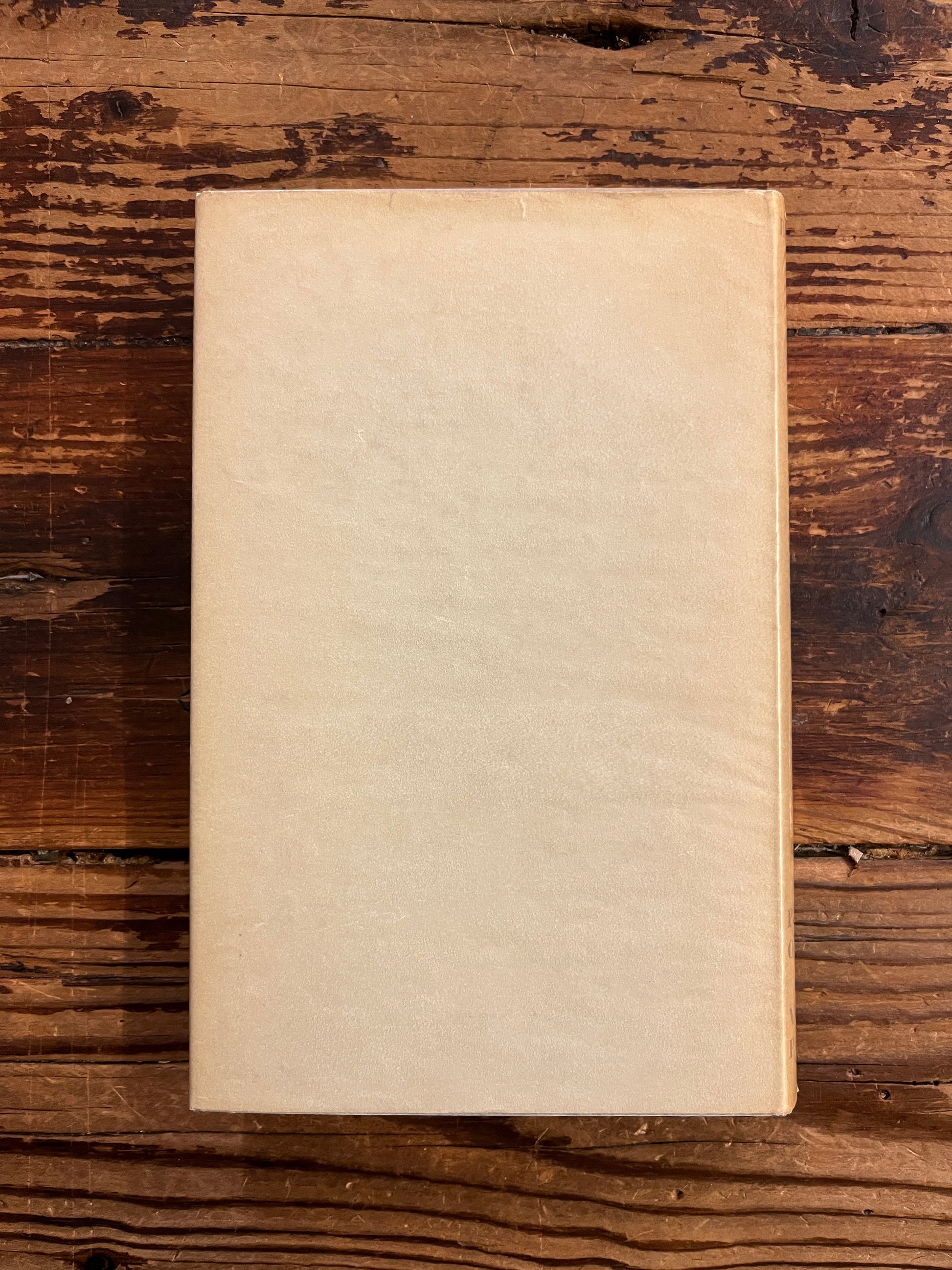 back cover of book titled 'From the World of the Cabbalah' on a wooden surface