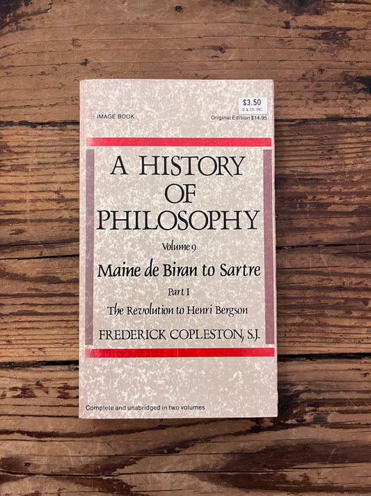 photo of the cover of the book " a history of philosophy" on a wooden background