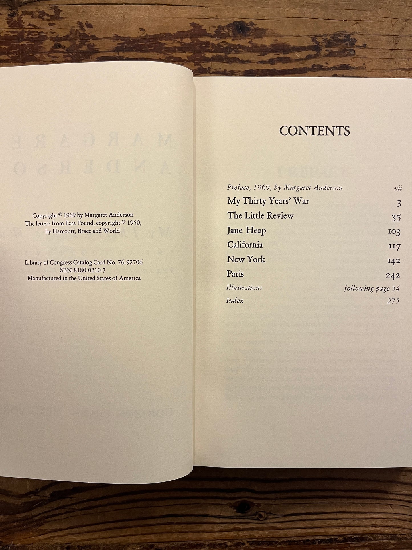 open book with the title 'My Thirty Years' War' by Margaret Anderson on a wooden surface